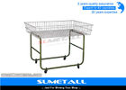 China Movable Metal Wire Storage Baskets Wire Promotion Table With 4 Wheel factory